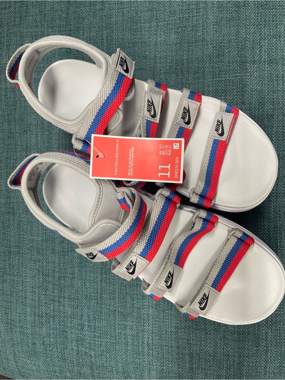 Nike Kids White Sandals with Red & Blue Striped Straps